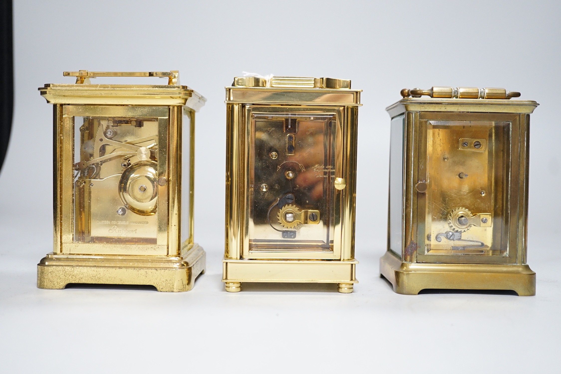 Two brass cased carriage timepieces and a brass cased carriage clock, tallest 11.5cms high